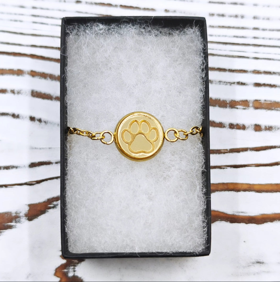 Pulsera huellita dorada