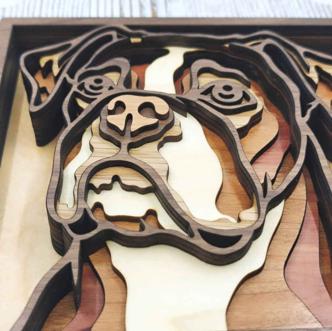 Detalle de cuadro de Boxer en madera con siete capas y diferentes tonos de madera