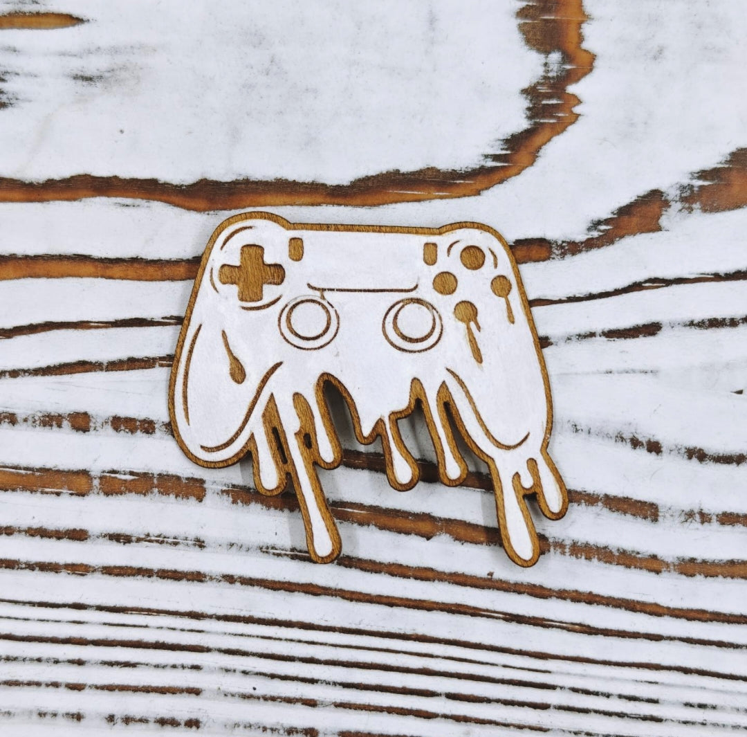 Sticker de madera de arce con diseño de control de videojuegos y acabado blanco para laptops, botellas y libretas.
